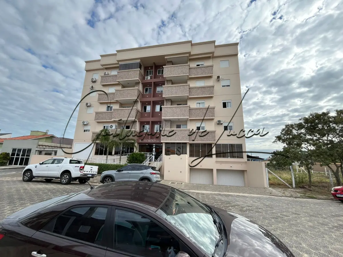 LOTE 000 - 1 (Um) apartamento residencial n. 408 no Edifício Florenza, no quarto pavimento, com duas vagas de garagem, matriculado sob n. 75.735 no Cartório de Registro de Imóveis de Araranguá, com área de 81,39m².