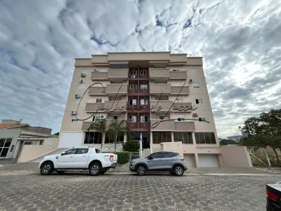 LOTE 000 - 1 (Um) apartamento residencial n. 408 no Edifício Florenza, no quarto pavimento, com duas vagas de garagem, matriculado sob n. 75.735 no Cartório de Registro de Imóveis de Araranguá, com área de 81,39m².