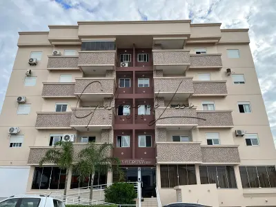 1 (Um) apartamento residencial n. 408 no Edifício Florenza, no quarto pavimento, com duas vagas de garagem, matriculado sob n. 75.735 no Cartório de Registro de Imóveis de Araranguá, com área de 81,39m².