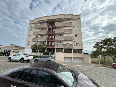 LOTE 000 - 1 (Um) apartamento residencial n. 408 no Edifício Florenza, no quarto pavimento, com duas vagas de garagem, matriculado sob n. 75.735 no Cartório de Registro de Imóveis de Araranguá, com área de 81,39m².